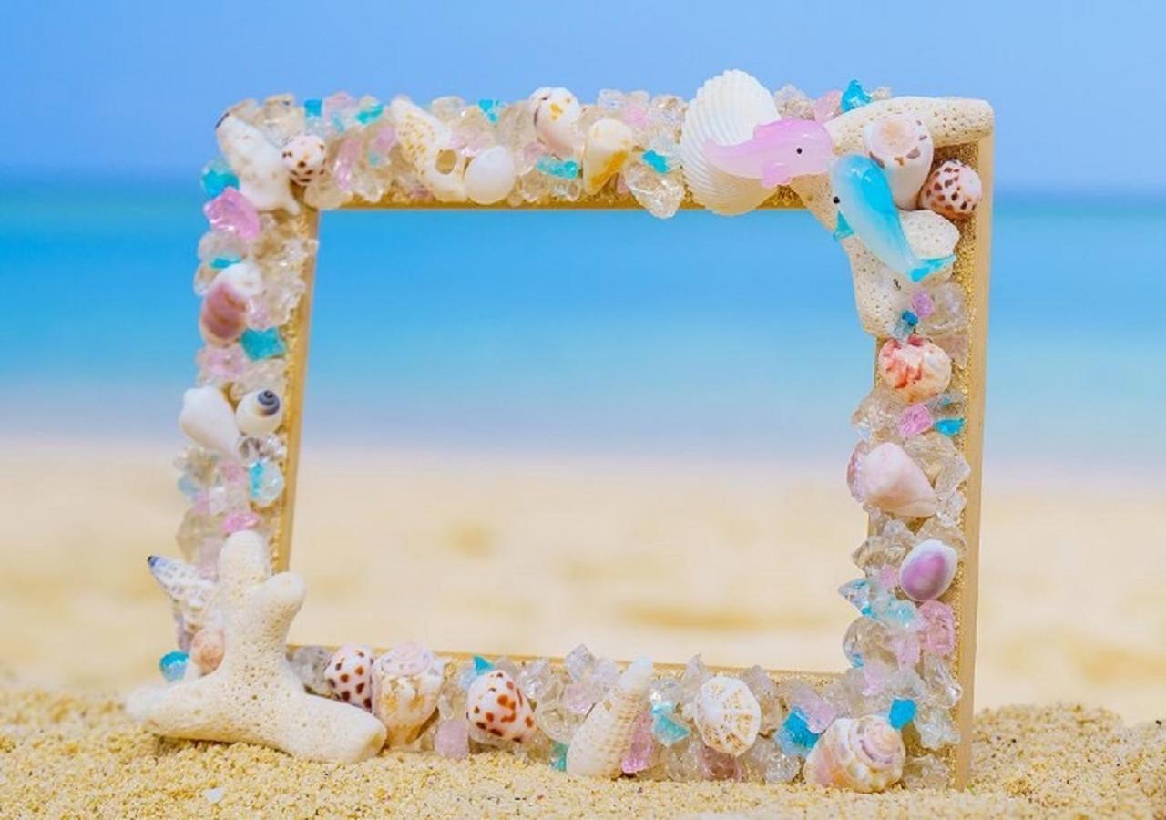 Hotel Monterey Okinawa Spa & Resort Onna Eksteriør billede A seashell frame